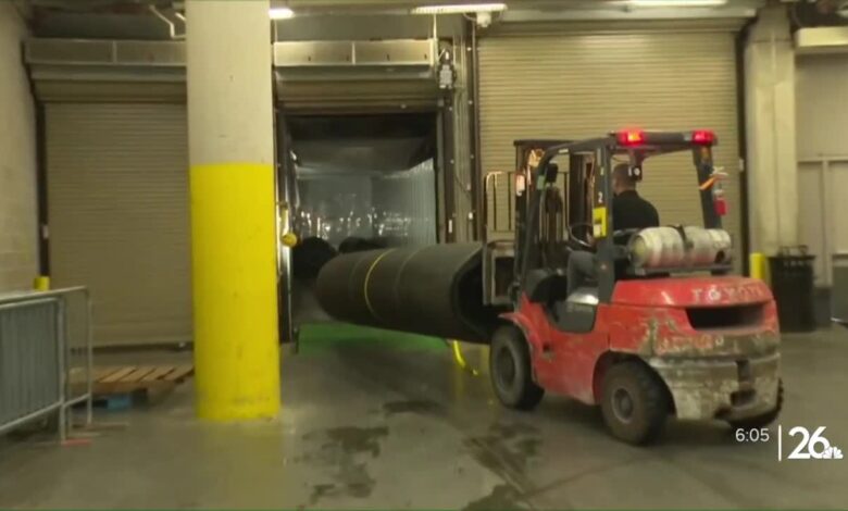 Turf tow blizzard hauls artificial field to the up