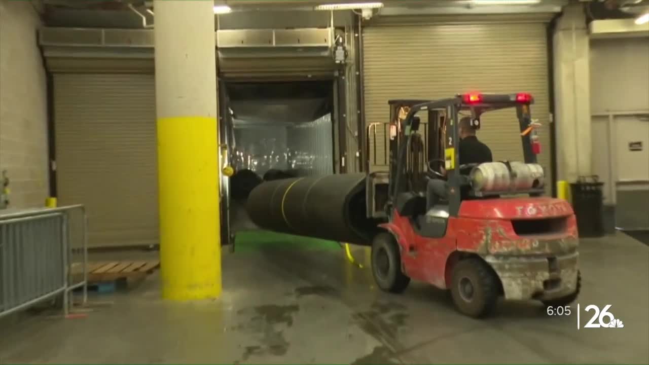 Turf tow blizzard hauls artificial field to the up