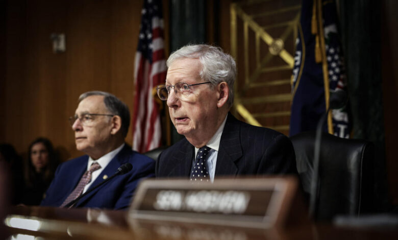 Mitch McConnell using a wheelchair after falling down stairs at the