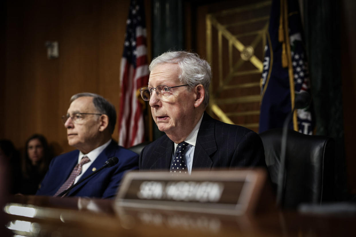 Mitch McConnell using a wheelchair after falling down stairs at the