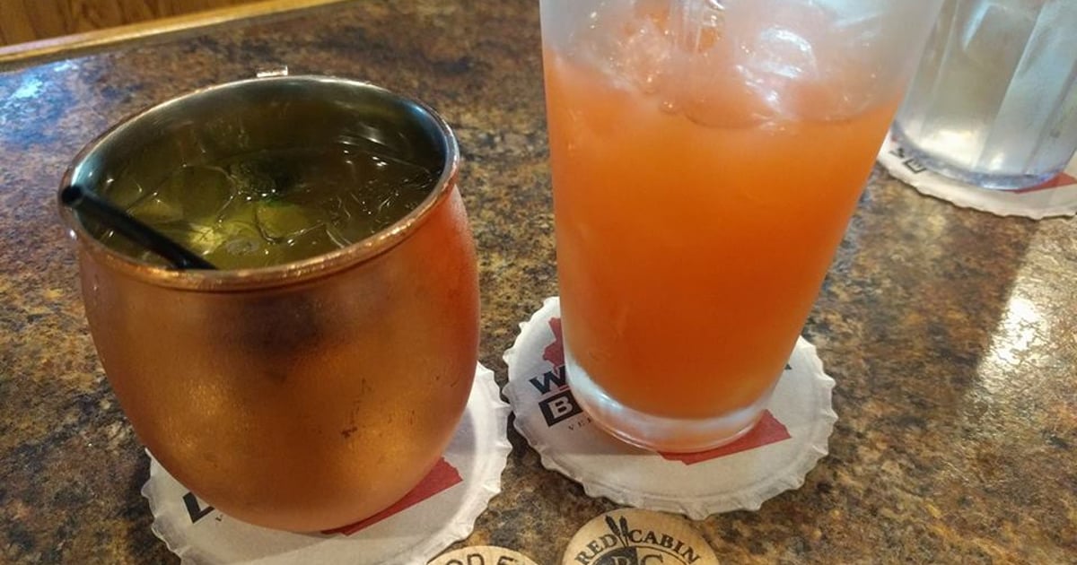 Red cabin on green acres country comforts restaurant with big city tastes